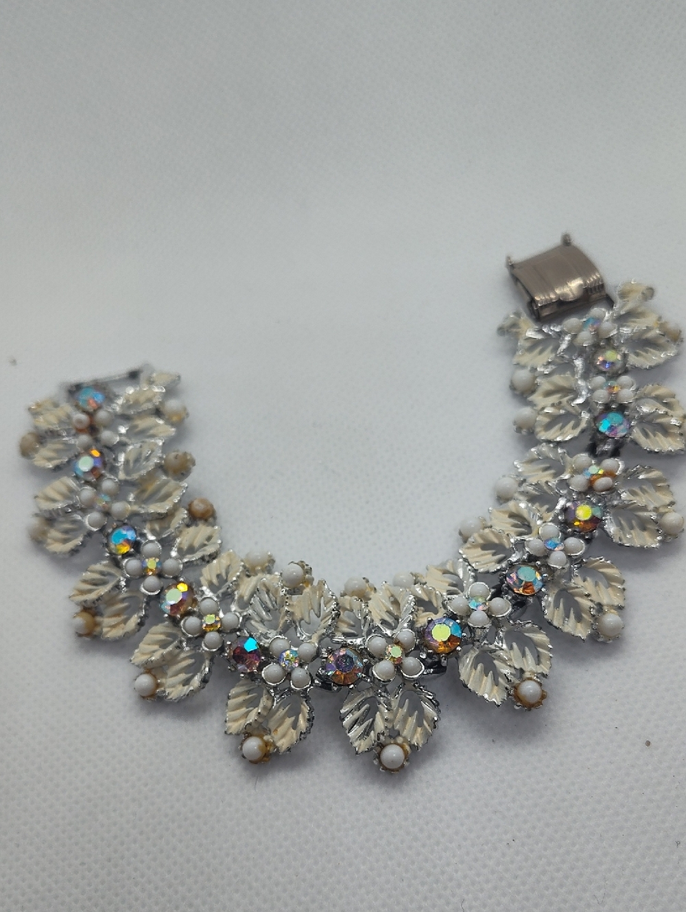 Art Pepper link bracelet 1960s Ivory Enamel, AB Rhinestones, Pearls.